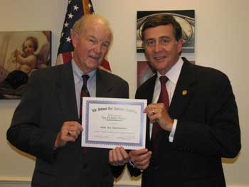 Photo 2: Congressman Gil Gutknecht receives the "Tax Fighter Award" from National Tax Limitation Committee President Lewis K. Uhler.
